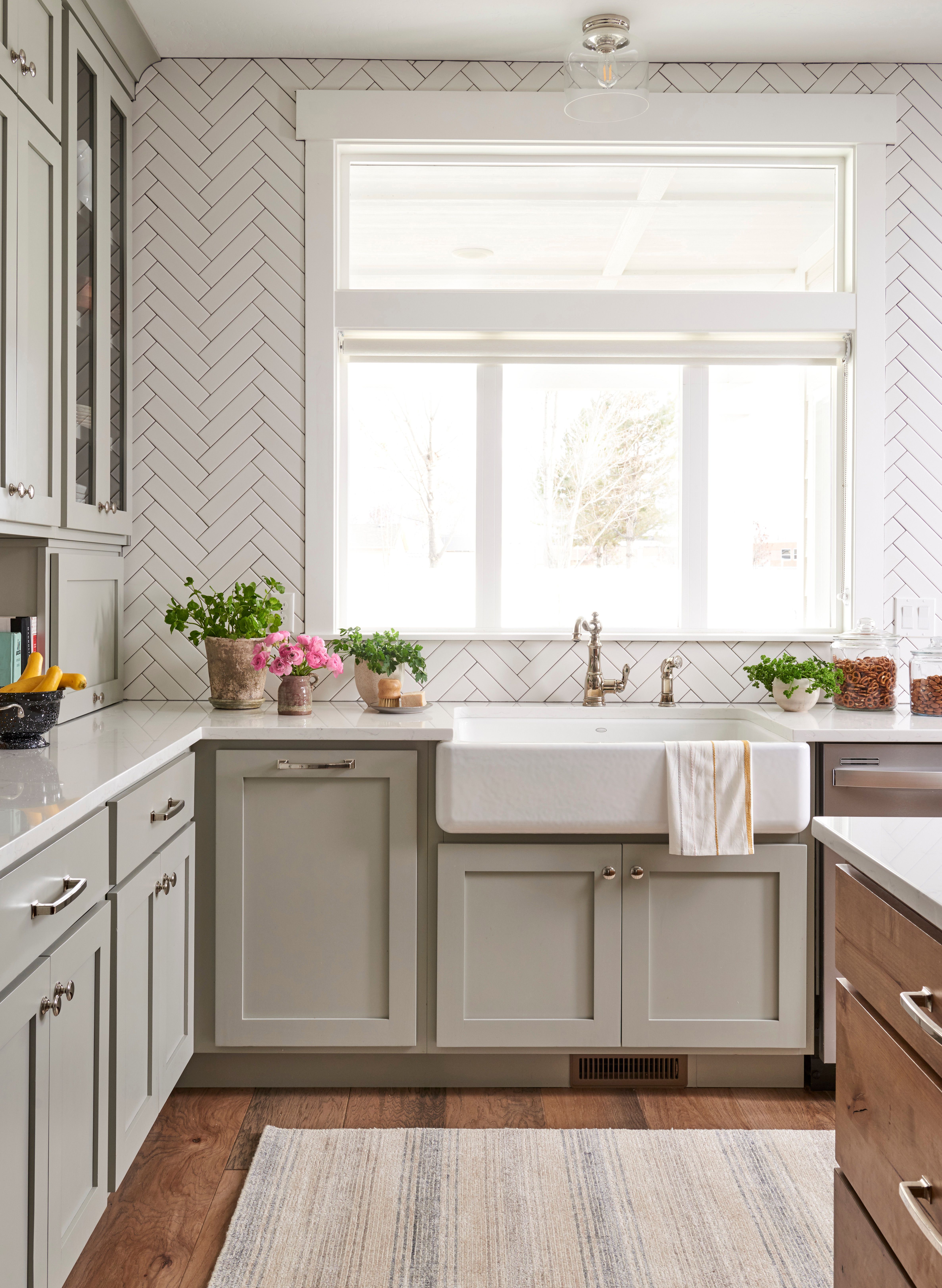 Kitchen with white tile and a farmhouse sink