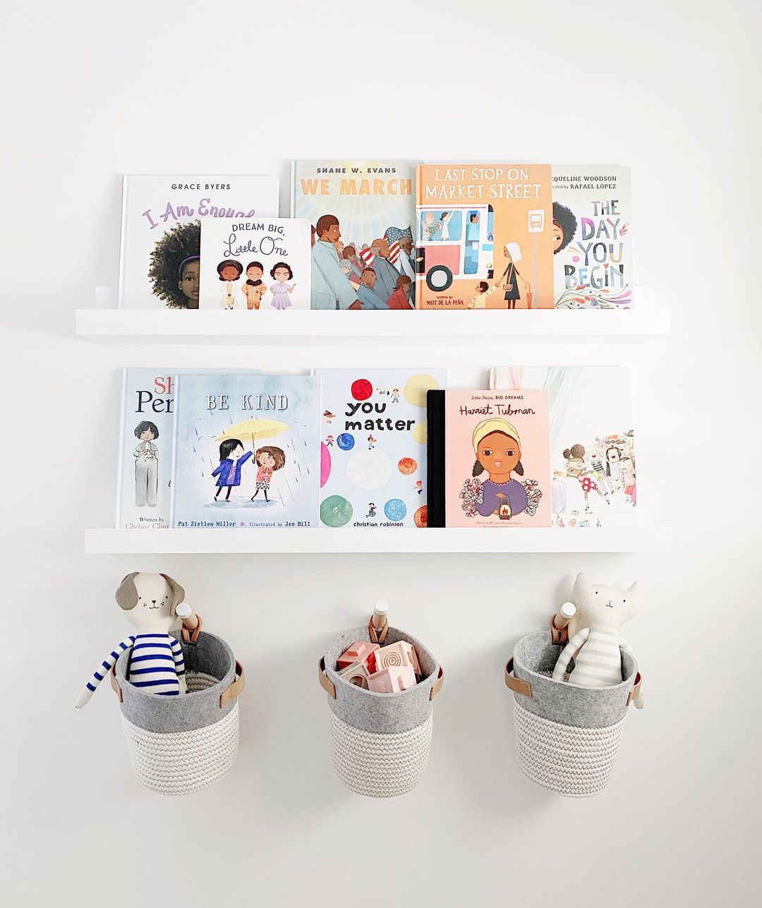 Wall-mounted baskets and shelves in nursery