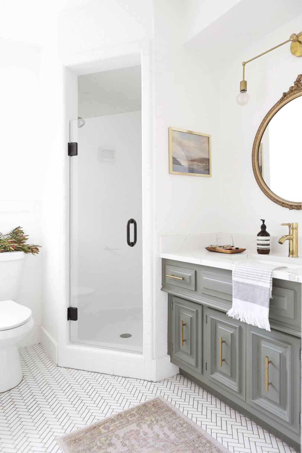Bathroom with glass shower door.