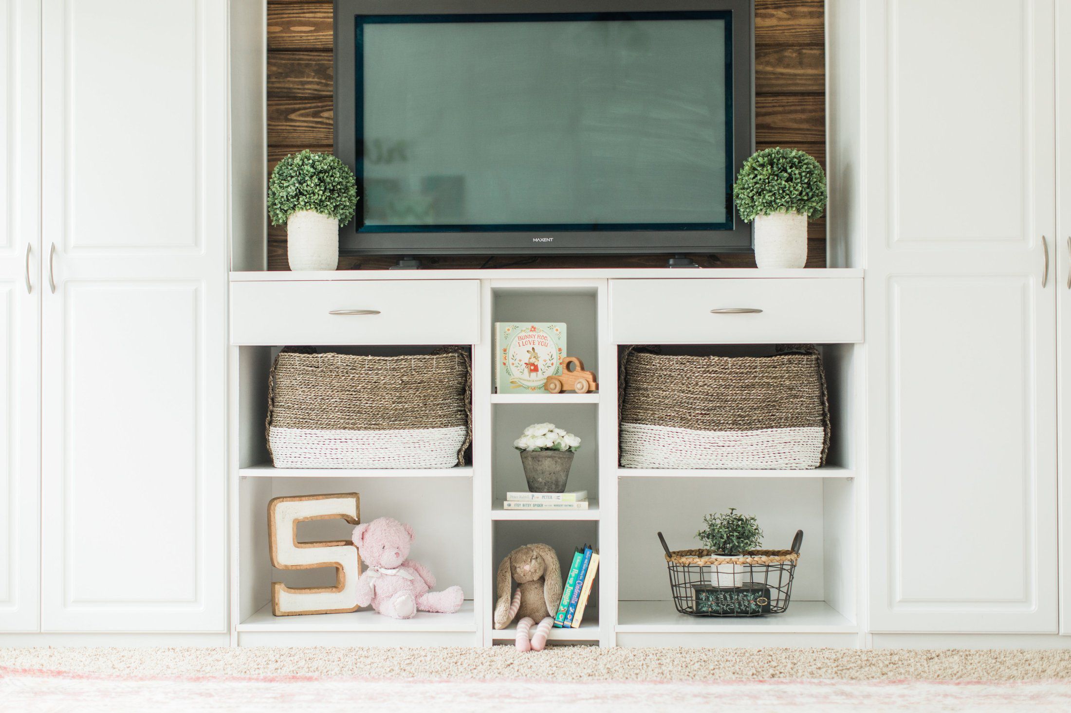 White play room with shelves
