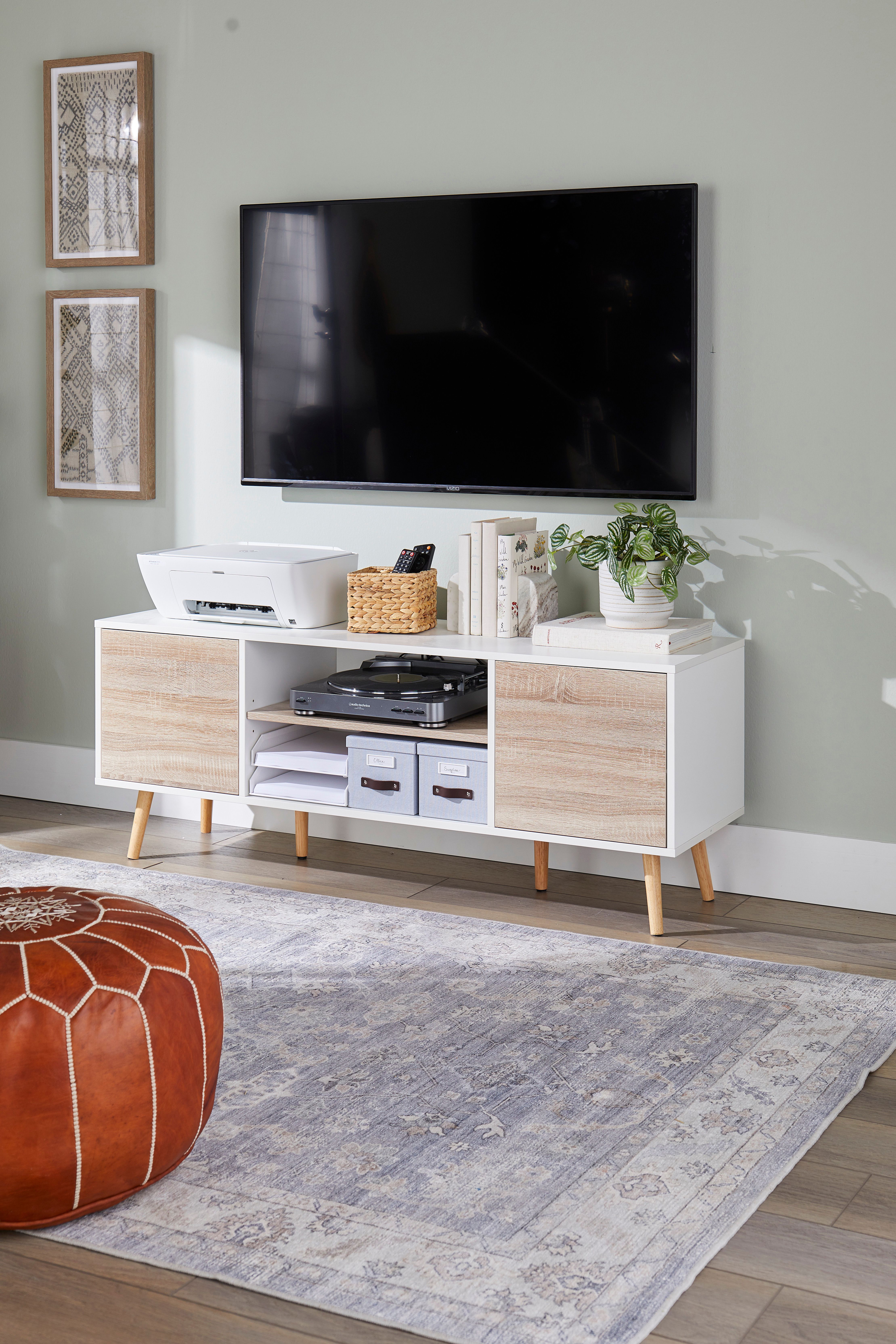 Living room with a TV and media console